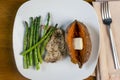 pork chop with sauteed asparagus and sweet potato