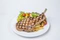 Pork Chop Steak served with fresh salad and french fried Royalty Free Stock Photo