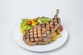 Pork Chop Steak served with fresh salad and french fried Royalty Free Stock Photo