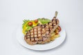 Pork Chop Steak served with fresh salad and french fried Royalty Free Stock Photo