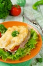 Pork chop with tomatoes, potatoes and cheese Royalty Free Stock Photo