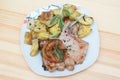 Pork chops with apples and potatoes Royalty Free Stock Photo