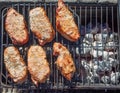 Pork chops on charcoal barbeque