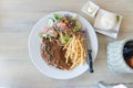 Pork chops steak with salad and french fries. Top view. Royalty Free Stock Photo