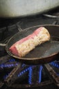 Pork Fillet steak cooking on stove Royalty Free Stock Photo