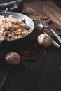 Pork fried rice is a common street food in Thailand. Served on a black wooden table Royalty Free Stock Photo