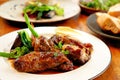 Pork gristle stew in white wine Royalty Free Stock Photo