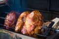 Pork ham meat is roasted on the open fire on Street of Prague, Czech Republic