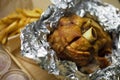 Pork hock in German on wooden board