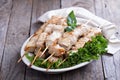 Pork kebabs with fresh salad leaves Royalty Free Stock Photo