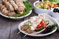 Pork kebabs on pita with vegetables Royalty Free Stock Photo