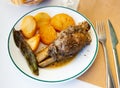 Pork knuckle with potatoes and stewed peppers Royalty Free Stock Photo