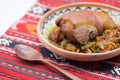 Pork knuckle with stew cabbage on a plate Royalty Free Stock Photo