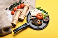 Pork or lamb ribs with decor on frying pan Royalty Free Stock Photo