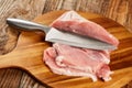 Pork leg and chef`s knife