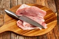 Pork leg and chef`s knife