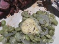 Pork loin dinner with lima beans and butter. Royalty Free Stock Photo