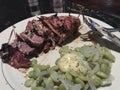 Pork loin dinner with lima beans and butter. Royalty Free Stock Photo