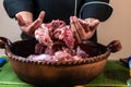 Pork meat preparation for cochinita tacos with Mexican chef