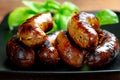 Pork meat sausages on a black plate Royalty Free Stock Photo