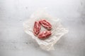 Pork meat. Pork slieces on white conkrete background Royalty Free Stock Photo