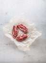 Pork meat. Pork slieces on white conkrete background Royalty Free Stock Photo