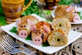 Pork meatballs stuffed with minced meat and rice in crispy chicken skin shaped funny pigs