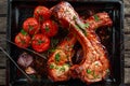 Pork middle chop roast with sweet and sour souce, baked tomatoes and red onion