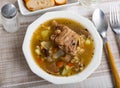 Pork and mushroom soup with vegetables and pearl barley Royalty Free Stock Photo