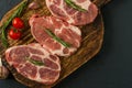 Pork neck raw meat for fresh Chop steaks on wooden cutting board. Top view Royalty Free Stock Photo