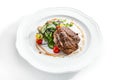 Pork Neck Steak with Mixed Salad on White Restaurent Plate Royalty Free Stock Photo