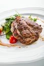 Pork Neck Steak with Mixed Salad on White Restaurent Plate