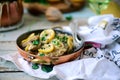 Pork picatta in copper bowl. style rustic Royalty Free Stock Photo