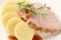 Pork with potato dumplings and white cabbage Royalty Free Stock Photo