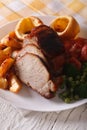 Pork with potatoes, fresh vegetables and Yorkshire pudding, vert Royalty Free Stock Photo