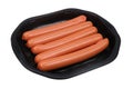 Pork raw sausages in a black plastic container islolated Royalty Free Stock Photo