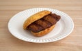 Pork rib sandwich on a paper plate Royalty Free Stock Photo