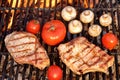 Pork Rib Steak, Tomato And Mushrooms On Hot BBQ Grill