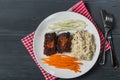 Pork ribs with American potato salad and carrot. The view from the top. Copy-space