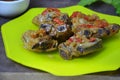 Pork ribs braised with soy sauce and vegetable tomato on the plate. Royalty Free Stock Photo