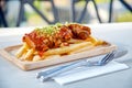 Pork ribs grill sauce with french fries on wood table Royalty Free Stock Photo