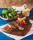 Pork Ribs Steak with vegetable salad And French fries Royalty Free Stock Photo