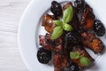 Pork ribs stewed with prunes closeup. horizontal top view Royalty Free Stock Photo