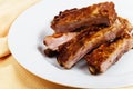 Pork ribs on white plate Royalty Free Stock Photo