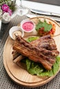 Pork ribs on wooden plate Royalty Free Stock Photo