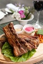 Pork ribs on wooden plate Royalty Free Stock Photo