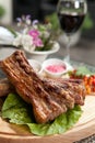 Pork ribs on wooden plate Royalty Free Stock Photo