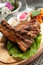 Pork ribs on wooden plate Royalty Free Stock Photo