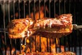 Pork roast on charcoal grill Royalty Free Stock Photo