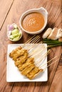 Pork satay,Grilled pork set on wood table , thai style